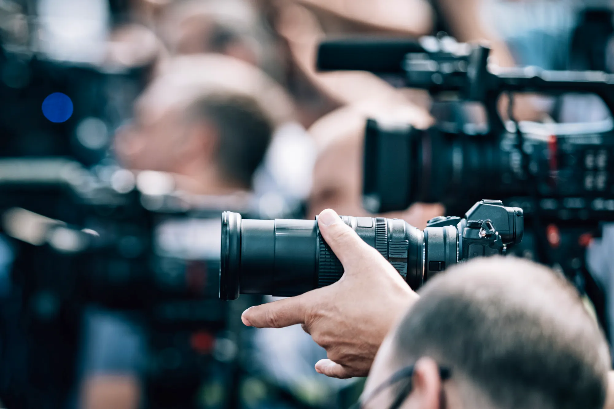 Live streaming. Camera at a Press Conference.