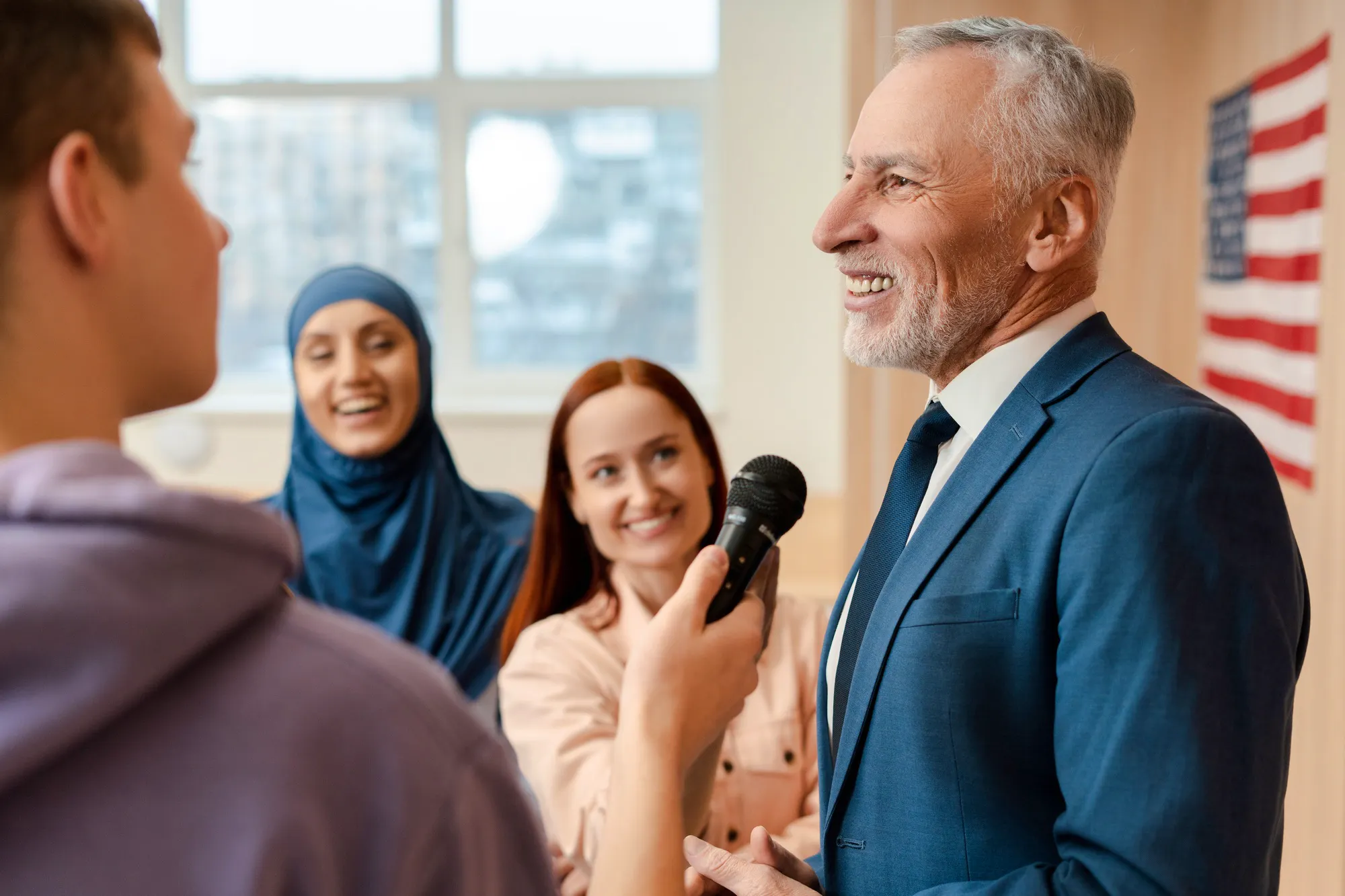 Senior man, politician communication with journalists. Press conference, presidential election